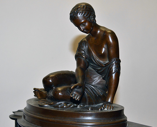 Lot 217_1: 19th c Nap.lll black marble mantle clock with bronze statue of kneeling girl with ball game. H39xW36cm.