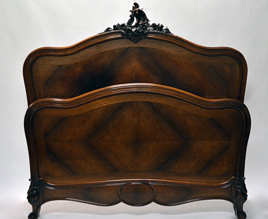 Lot 240: 19th cent Naplll, Louis XV  rosewood double bed with richly sculpted pediment. Max W145cm.