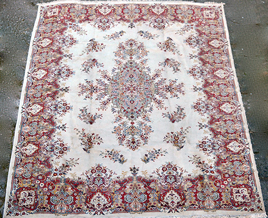 Lot 247: Large oriental wool carpet; 460 x 340cm.