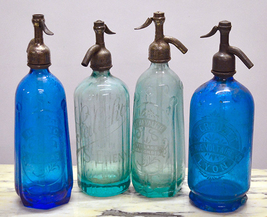 Lot 371: Four 19th cent blue colored soda bottles. Max H32cm.