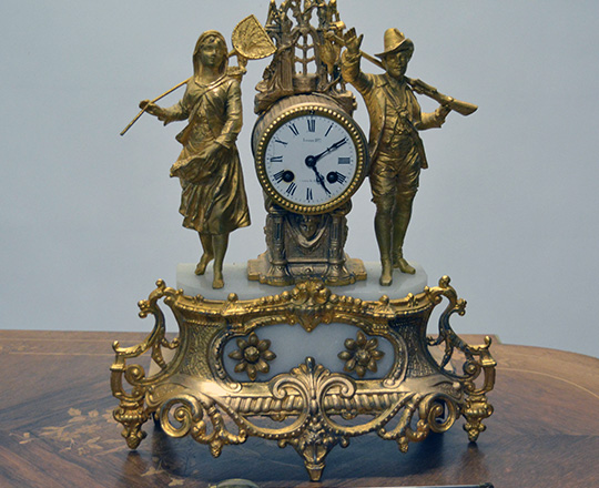 Lot 373: 19th cent gilt spelter mantle clock with couple. H42cm.
