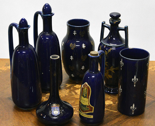 Lot 379: Various 19th cent cobalt blue ceramique bottles, vases, amphor, ect. Max H30cm.