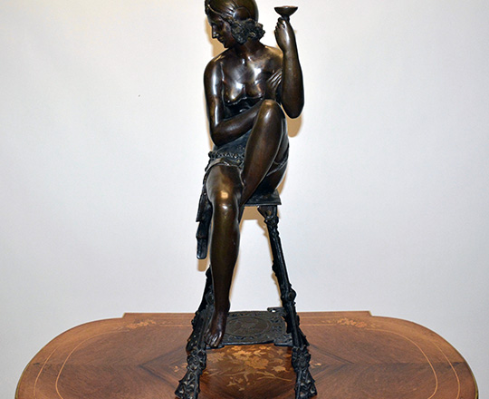 Lot 389: Large bronze sculpter of (1920's Oriental?) woman on a stool with a cup. H 82cm.