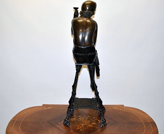 Lot 389_2: Large bronze sculpter of (1920's Oriental?) woman on a stool with a cup. H 82cm.