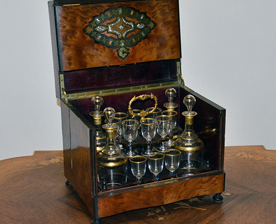 Lot 395: Beautiful 19th c Nap.lll liquor cabinet with fine marquetry and extactable glass service set, one glass missing.