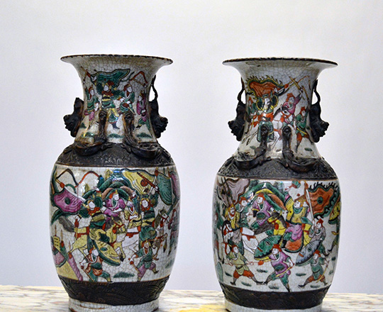 Lot 433: Pair 19th cent Chinese ceramic Nankin baluster vases with worrior scenes. H 36cm.