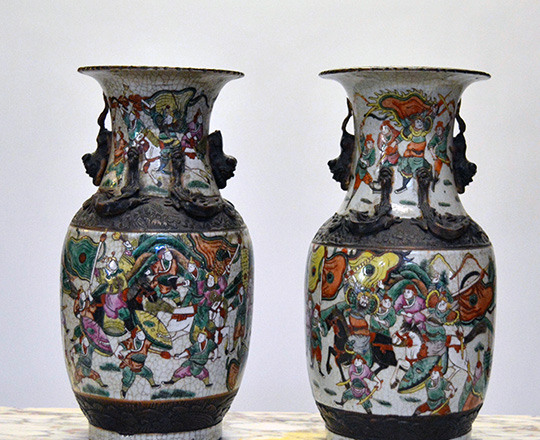 Lot 433_1: Pair 19th cent Chinese ceramic Nankin baluster vases with worrior scenes. H 36cm.