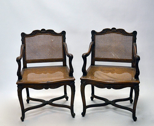 Lot 435_2: Pair 18th ? 19th cent caned Louis XV / Regence walnut armchairs with stretcher base.