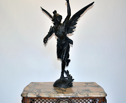 Lot 448: Large imposing bronze statue of winged woman representing 'Victory'. H72cm.