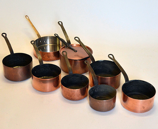 Lot 485: Set of seven + one copper pots of which one lidded. max.dia.22cm.