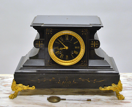 Lot 490: 19th c Nap.lll black marble mantle clock. H23,5 x W37cm.