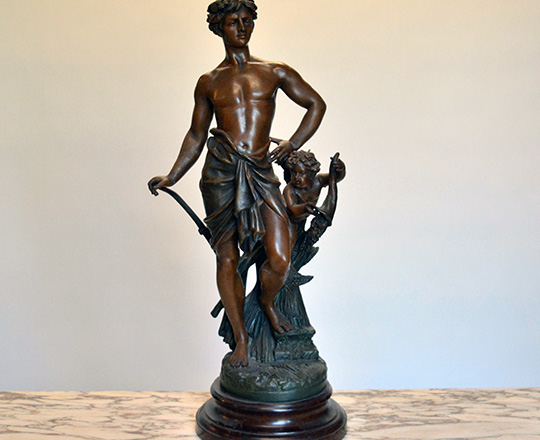 Lot 497: Turn cent bronze wash spelter statue of man representing 'Agriculture'. H62cm