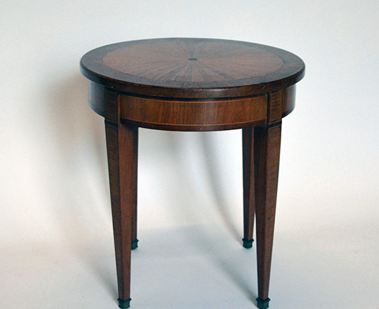 Lot 520:  Small Louis XVI rose wood sun burst marquetry top round table. H48,5 x dia.45cm.