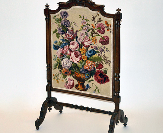 Lot 521: Turn cent Louis XVI fire screen with fine needle point floral decor. H109 x W63cm.