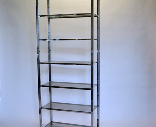 Lot 537: Seven smoked glass shelves chrome unit. H200xW80xD35cm.
