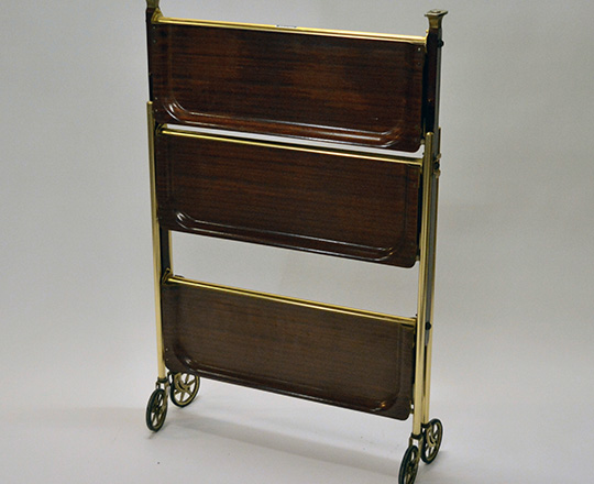 Lot 538_1: 50's folding tray cart on wheels with three platters. W62 x D44cm (platter).